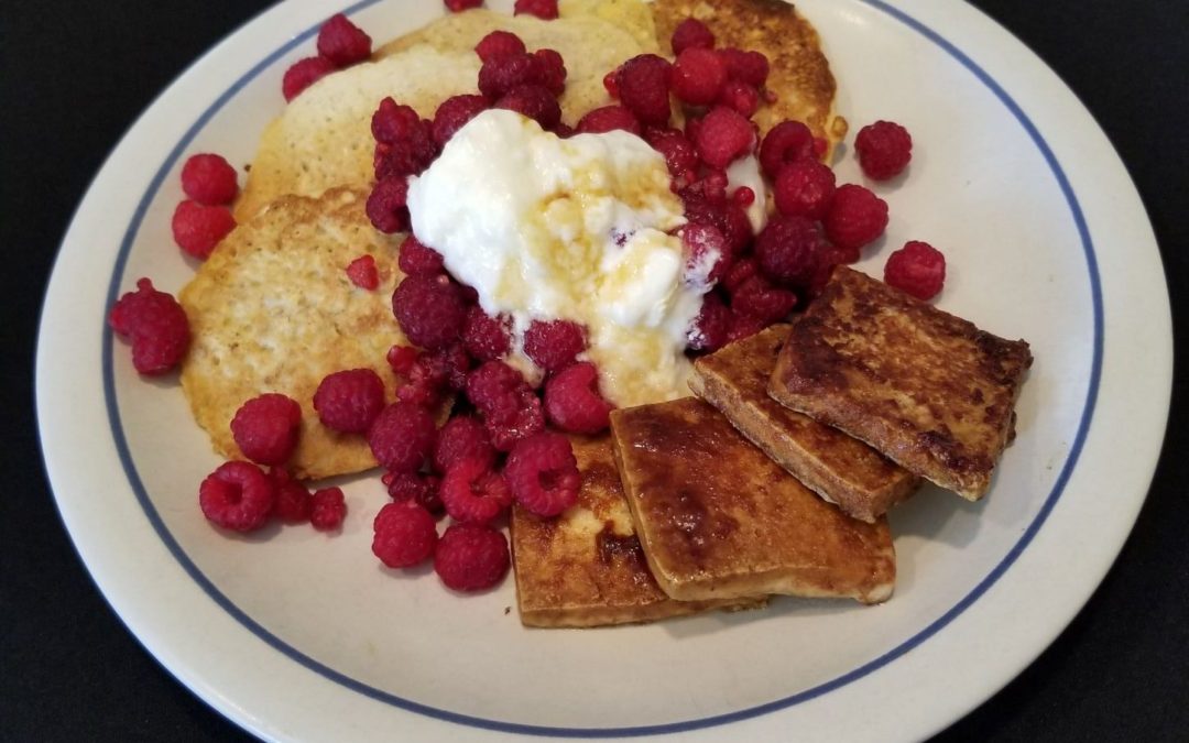 Raspberries Atop Oatmeal Pancakes for Two