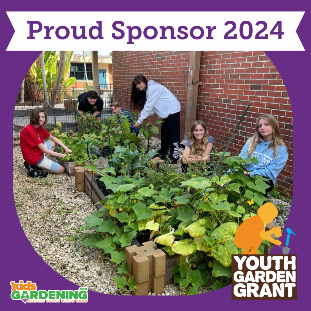 Two wooden-framed vegetable garden beds are surrounded by several middle school aged students who are smiling at the camera. The photo features a graphic frame with the words Proud Sponsor 2024 at the top. Along the bottom are a logo that says KidsGardening.org Helping Young Minds Grow and a second logo that says Youth Garden Grant.